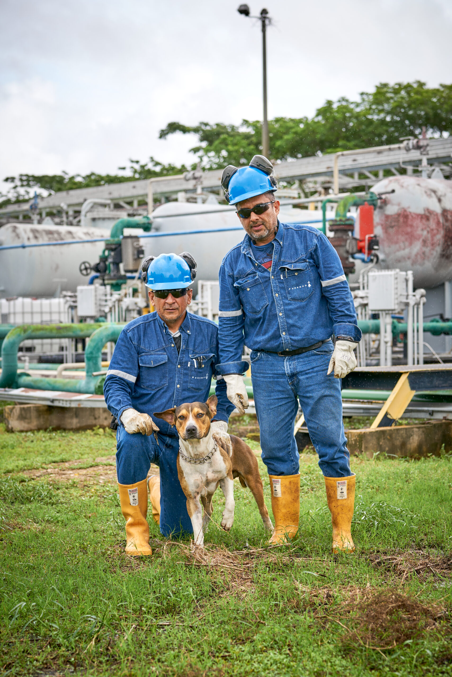 Chaparrito men working with a dog onshore Colombia