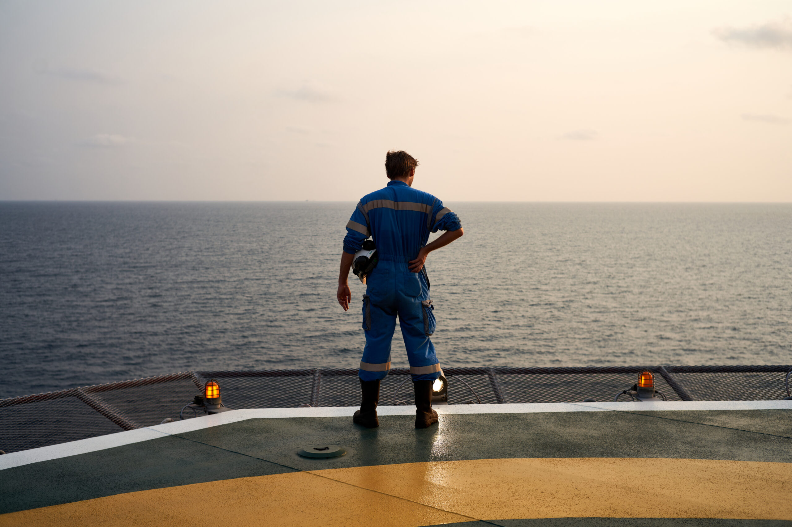 Worker looking at horizon in Gabon