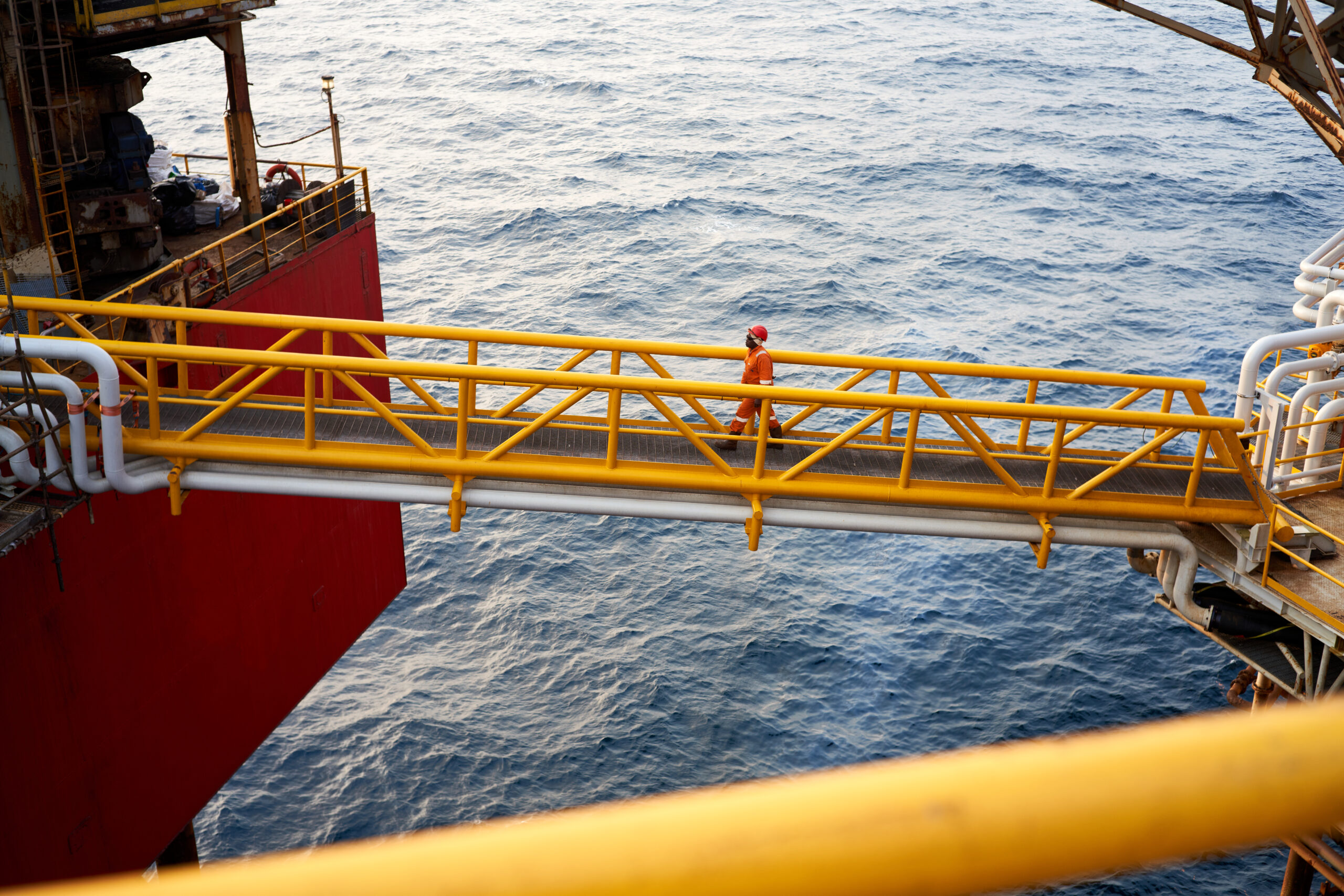 Worker walking on the bridge station in Gabon