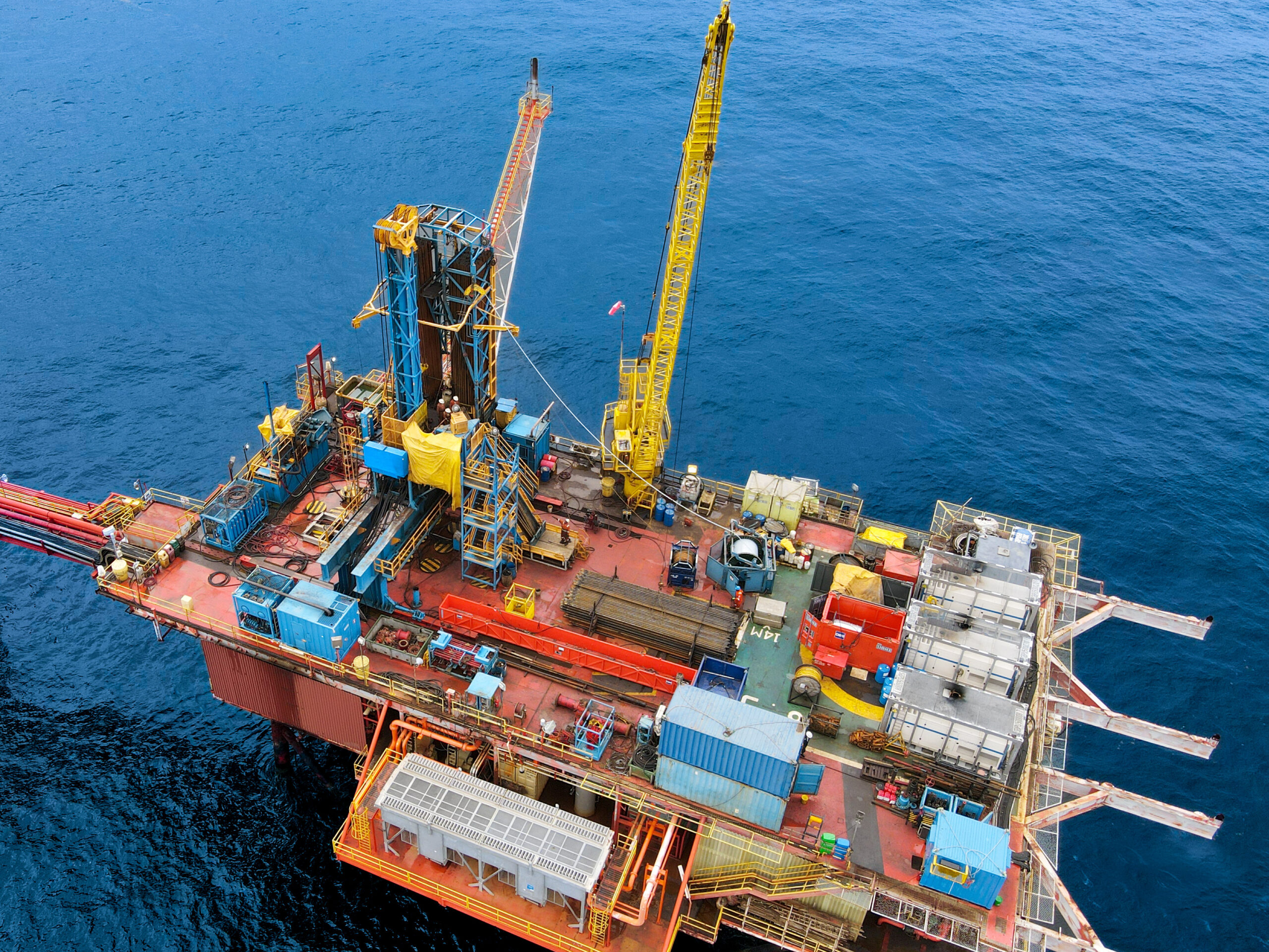 Big platform with craves in the middle of the sea in Trinidad and Tobago
