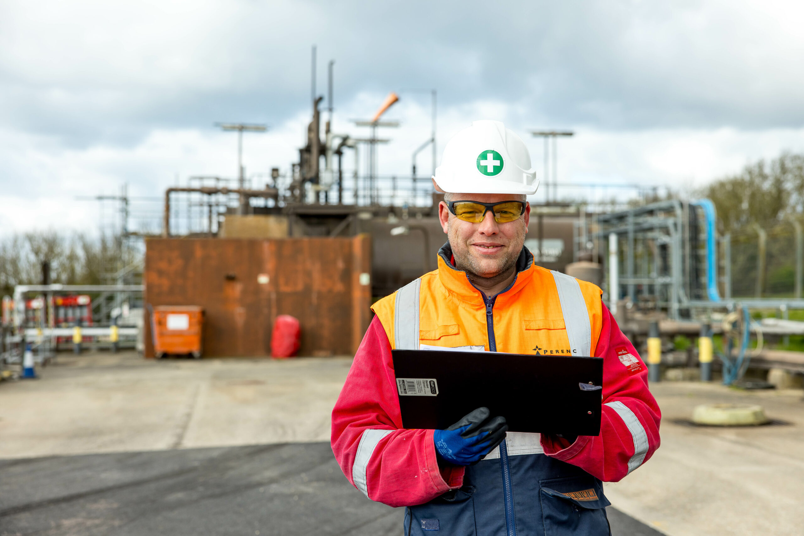 Worker wolding documents looking at us in United Kingdom